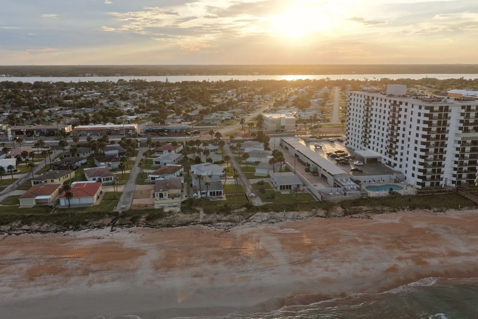 Sunset over beachfront buildings, shot in Ormond-by-the-Sea.
